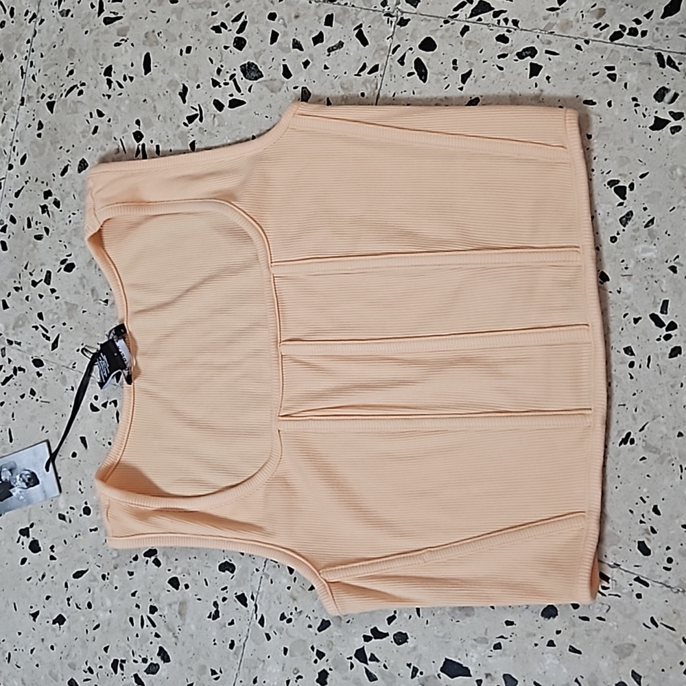 A peach corset top